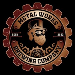 Metal Works Brewing Company logo featuring a steampunk-style design with a gear border, a bearded figure wearing goggles and a top hat, and text that reads 'Metal Works Brewing Company, ESTD 2022.