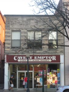 Storefront of Caveat Emptor, a used and rare bookstore at 112 N. Walnut Street on the Bloomington Courthouse Square