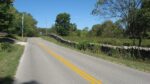 Maple Grove Road northwest of Bloomington, lined with a dry-laid stone wall, in the Maple Grove Road Rural Historic District where Peden Farm is located