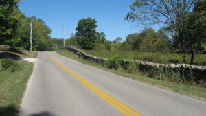 Maple Grove Road northwest of Bloomington, lined with a dry-laid stone wall, in the Maple Grove Road Rural Historic District where Peden Farm is located